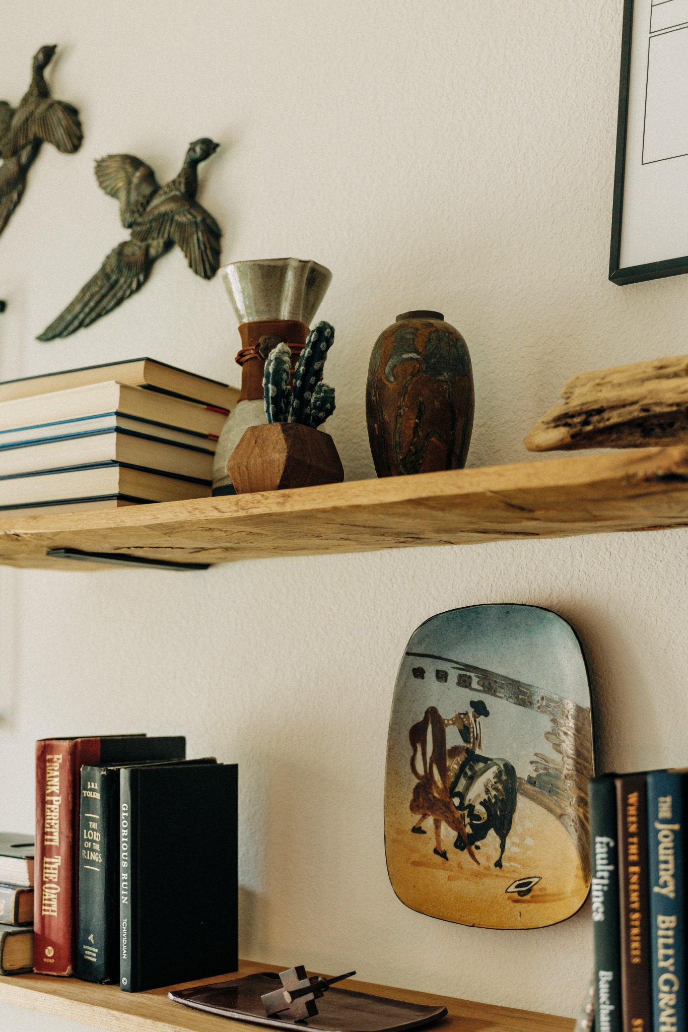 Wyatt Run bookshelf detail with books and collected objects
